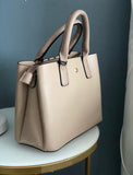 Classic nude tote with divided interior compartments