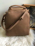 Modern taupe backpack with gold accents